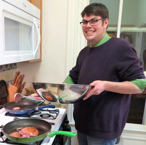 Jason Entsminger was seen flipping pancakes at this year’s Dignity/Washington Mardi Gras Party held at the Dignity Center